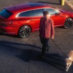 at0353-shootingbrake-3-4-back-side-man-with-dog